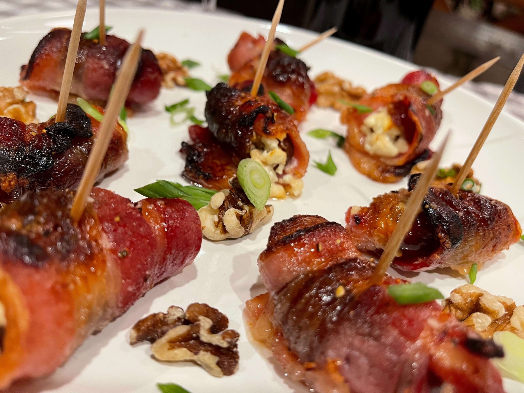 Goat Cheese Stuffed Bacon Wrapped Dates with Honey Drizzle